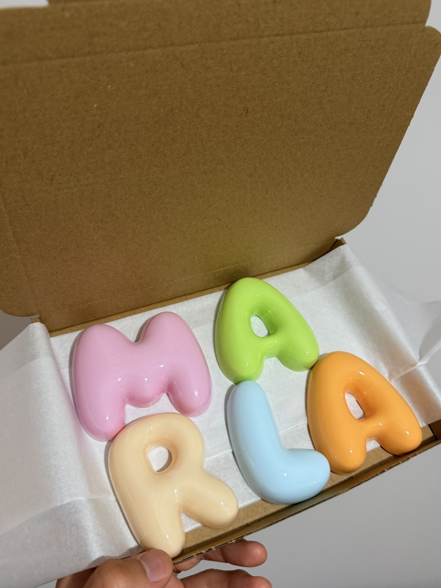 Pastel MILA bubble letters packed by hand