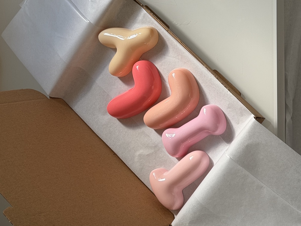 Glossy pink, peach and cream letters in gift packaging